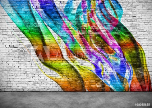 Picture of abstract colorful graffiti on brick wall